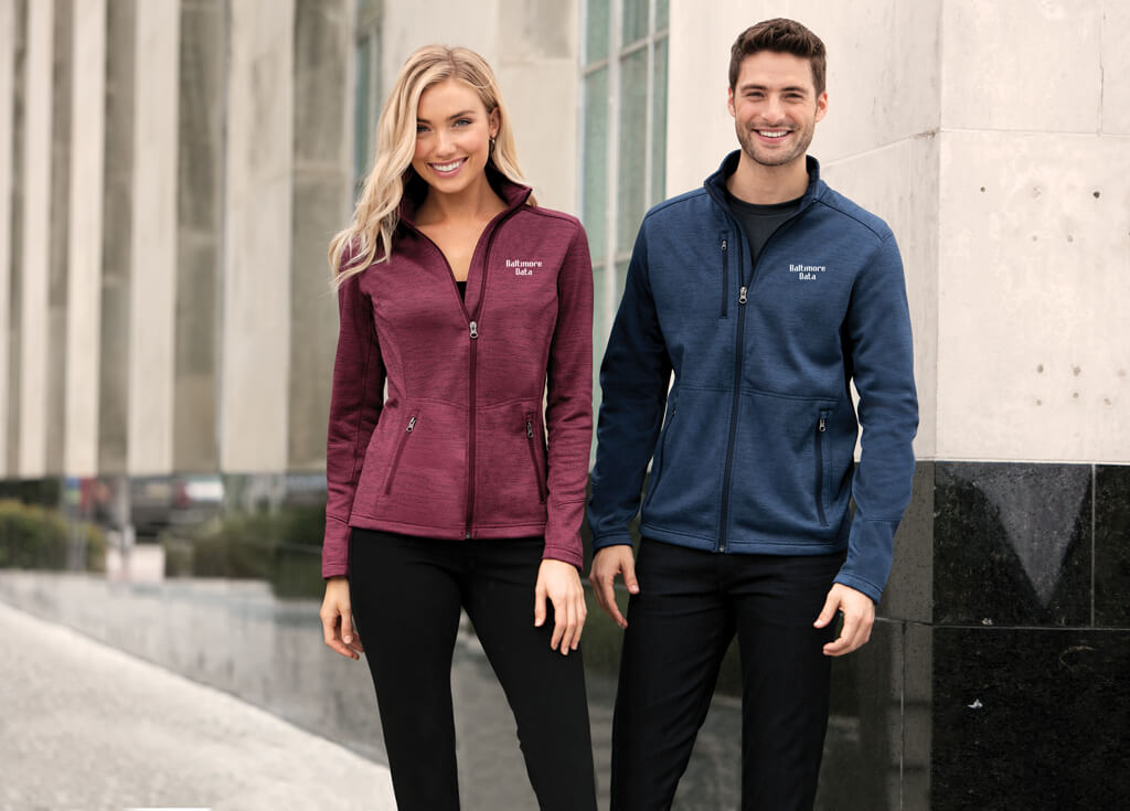 Decorated Apparel and Promotional Products for Baltimore, Maryland. couple in custom printed polo shirts walking